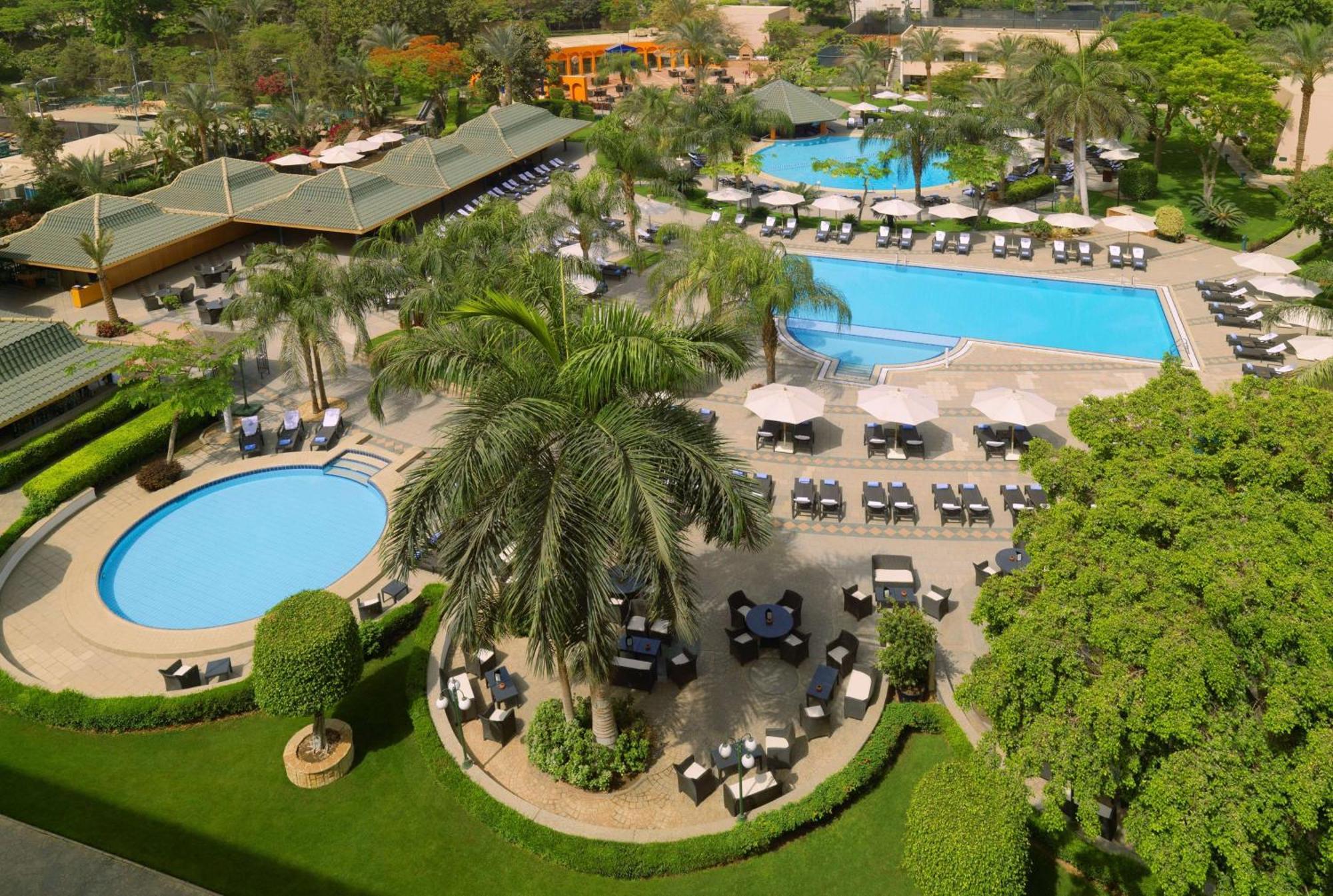 Hilton Cairo Heliopolis Hotel Ngoại thất bức ảnh The pool at the Serena Hotel